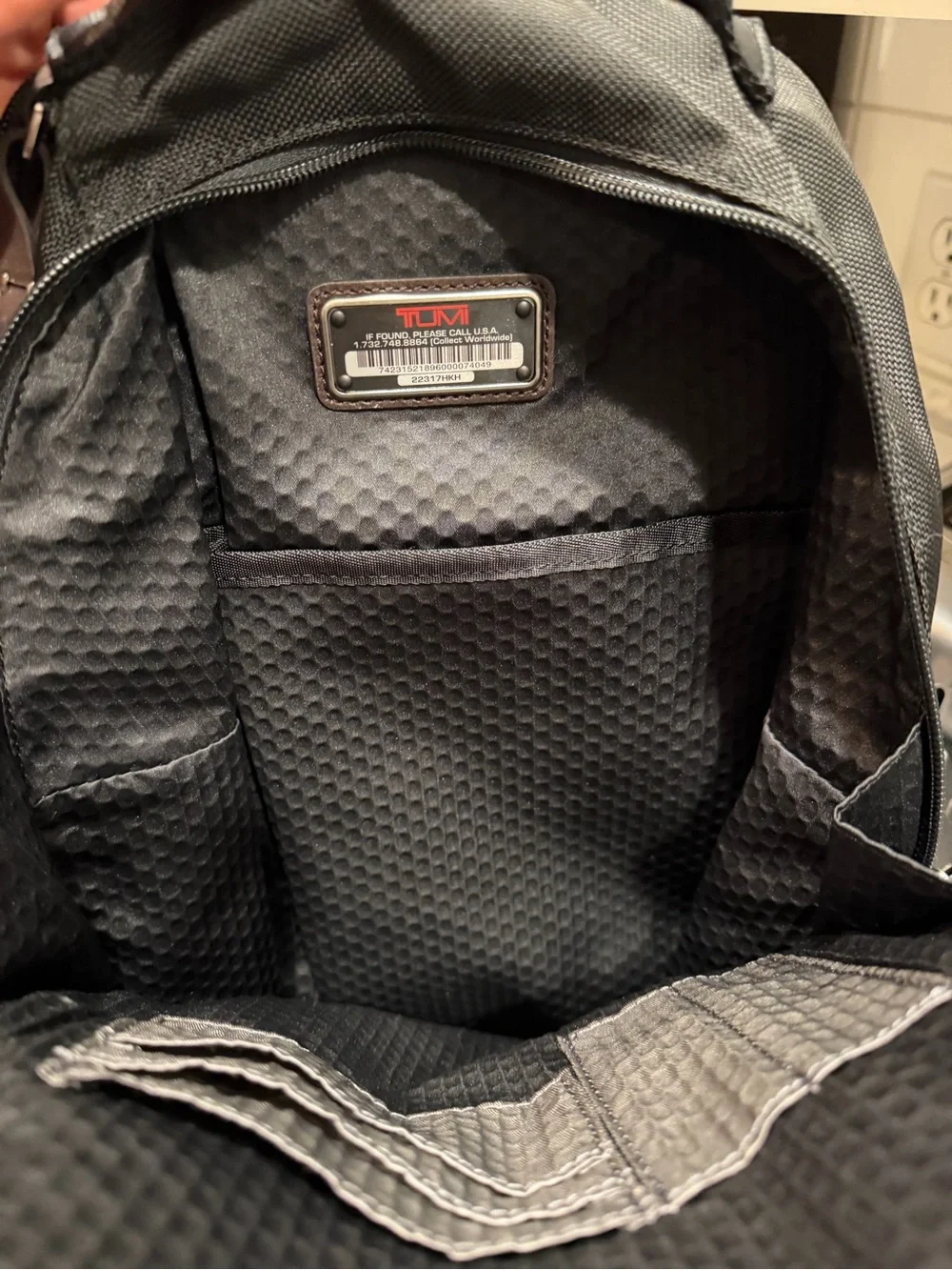 Tumi compact backpack
